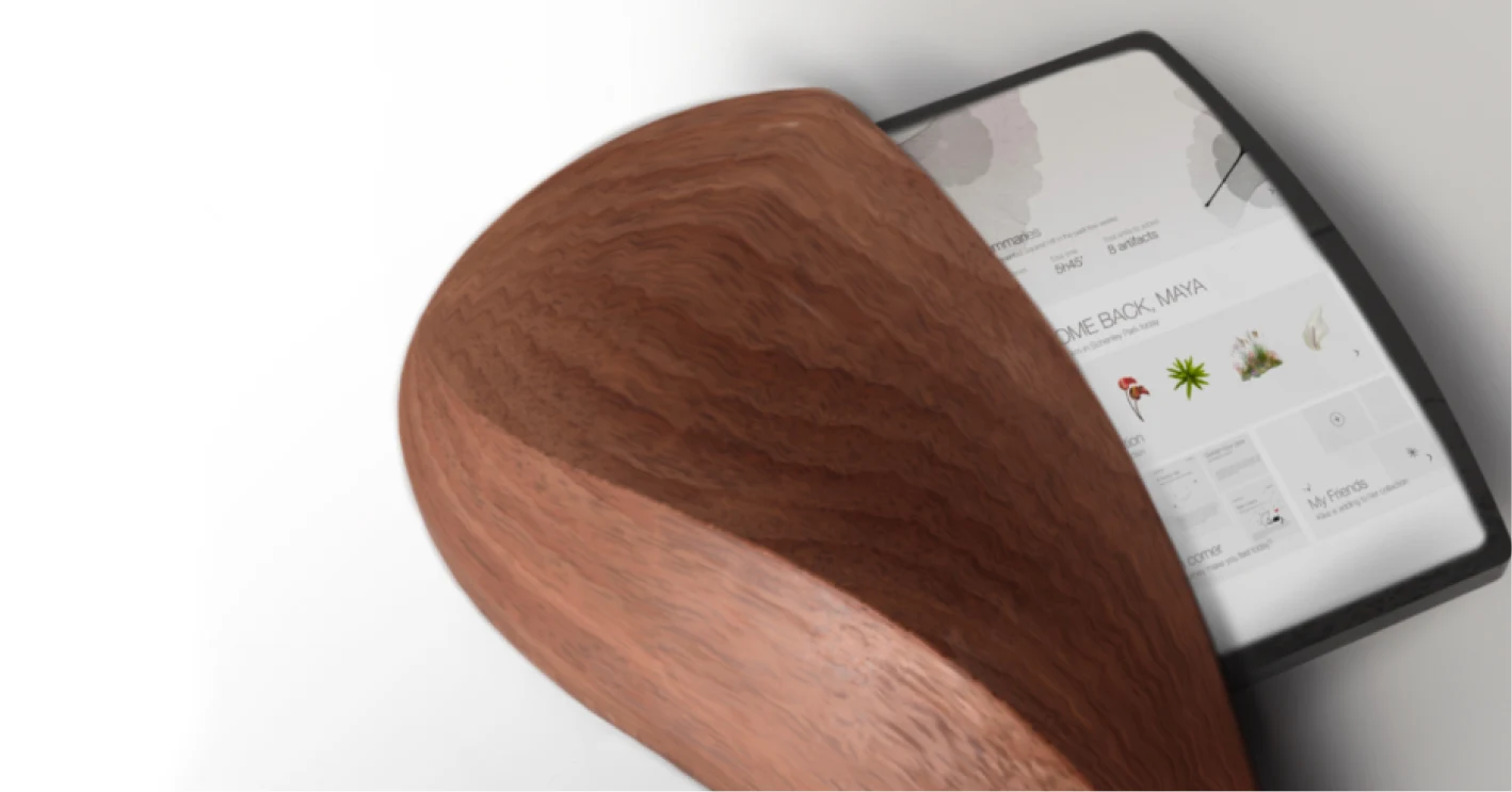 A render on a pale ground: a carved walnut shell curls away from a dark-edged tablet, revealing a screen of app cards with a heading reading welcome back.